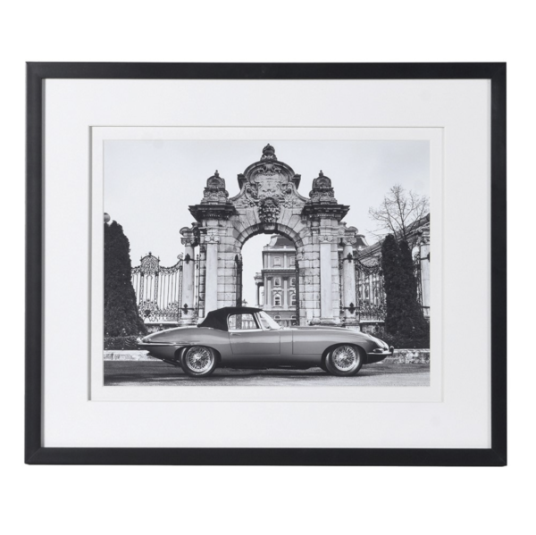 The classic picture featuring the iconic 1968 Jaguar car in a French chateaux setting ibn black 6 white, black framed in passe partout Measurements: H:48 W:58 cm