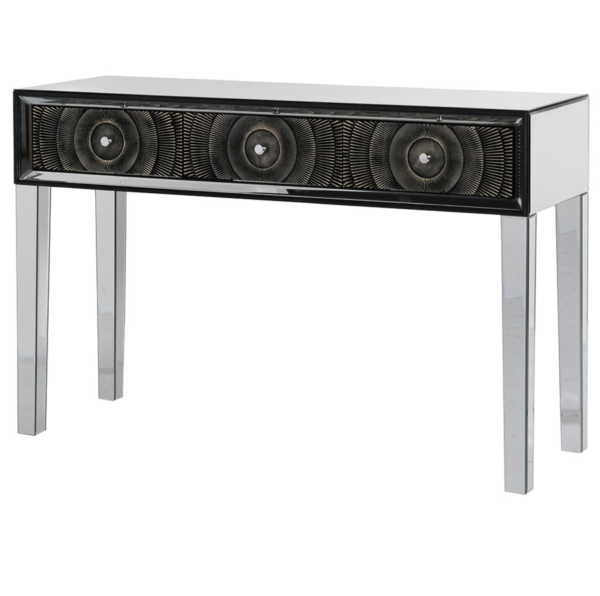 Zodiac Mirror & Wood Console Table 3 Drawers. Introduce a touch of sophistication to your space with our elegant Zodiac Console Table. This statement piece features a striking combination of mirror framing and wood, creating a harmonious balance between modern and classic design elements. The console table is equipped with three spacious wooden drawers, adorned with intricate golden and black circle detailing that adds a luxurious flair. The mirrored framing not only enhances the visual appeal but also reflects light, making your space feel brighter and more expansive. Perfect for an entryway, living room, or hallway, this console table serves both as a functional storage solution and a captivating focal point in your decor. Let the Zodiac Console Table elevate your interior with its refined elegance and distinctive design. Measurements: H:79 W:120 D:40 cm.