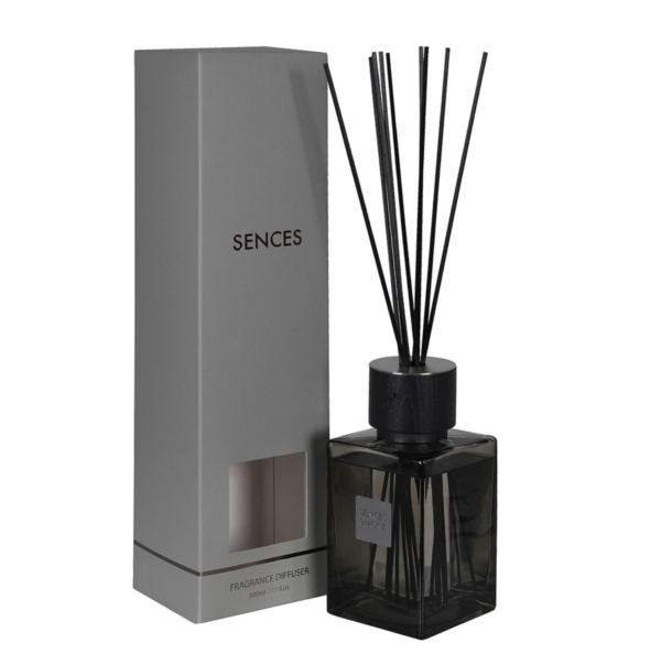 Our popular Large Aromatic Diffuser comes in a stylish grey glass container. It offers a deep, aromatic mix of smokey fragrances with wood and soft spicy smoke on top notes and exquisite masculine leather heart notes creating an inviting and cozy warm aroma that stimulates the sences while bringing a sense of fulfillment to any space. Measuring H 17 cm (with sticks 38,5 cm) and D 8 cm, this generously sized diffuser offers an impressive longevity, ensuring you can enjoy its captivating scent for hours on end. Perfect for creating a warm and inviting atmosphere in any space. For optimal performance, it is recommended to flip the reeds regularly to refresh the fragrance and ensure an even scent distribution.For optimal performance, it is recommended to flip the reeds regularly to refresh the fragrance and ensure an even scent distribution.